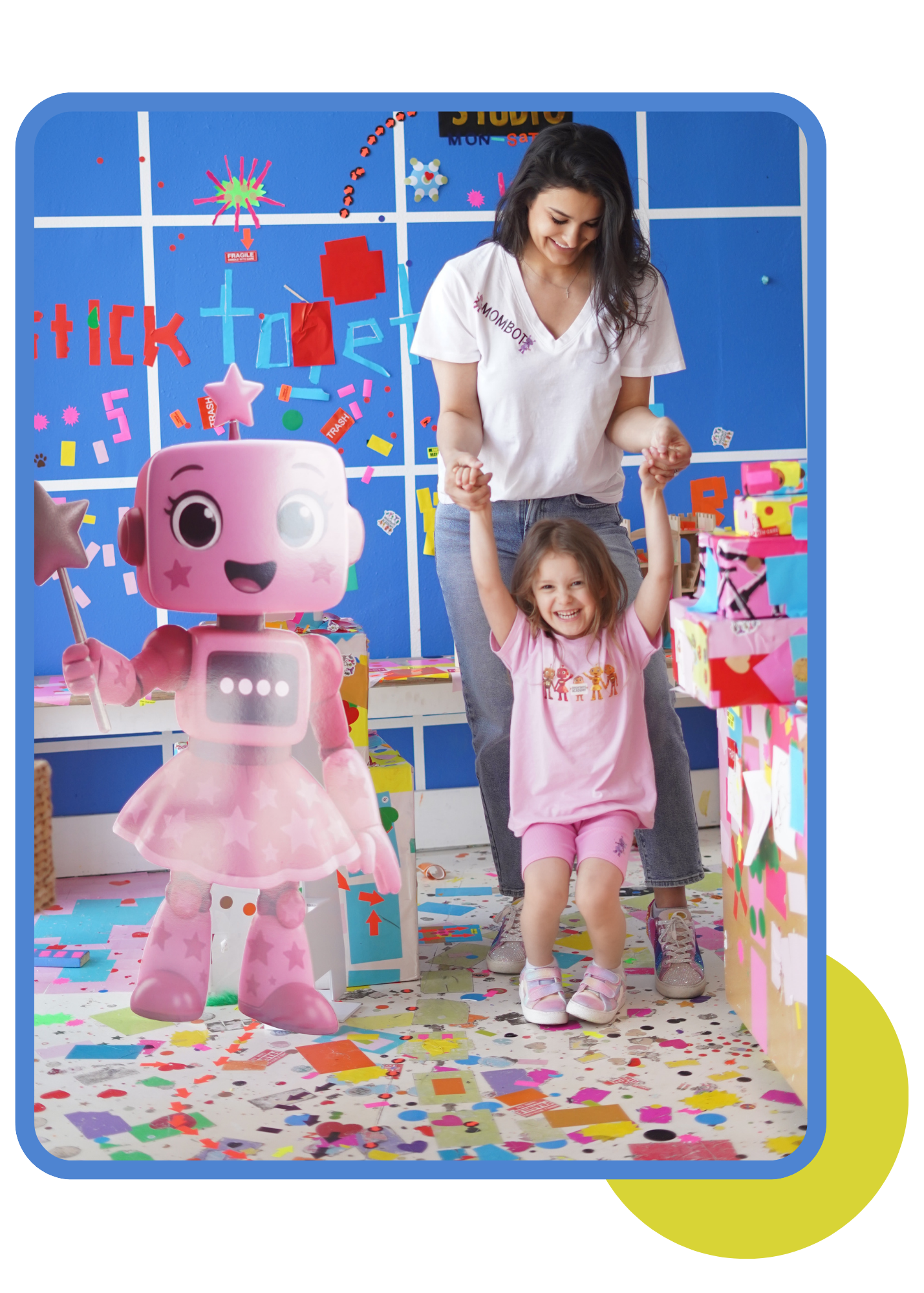 Mom and daughter with the pink BrightBots robot mascot